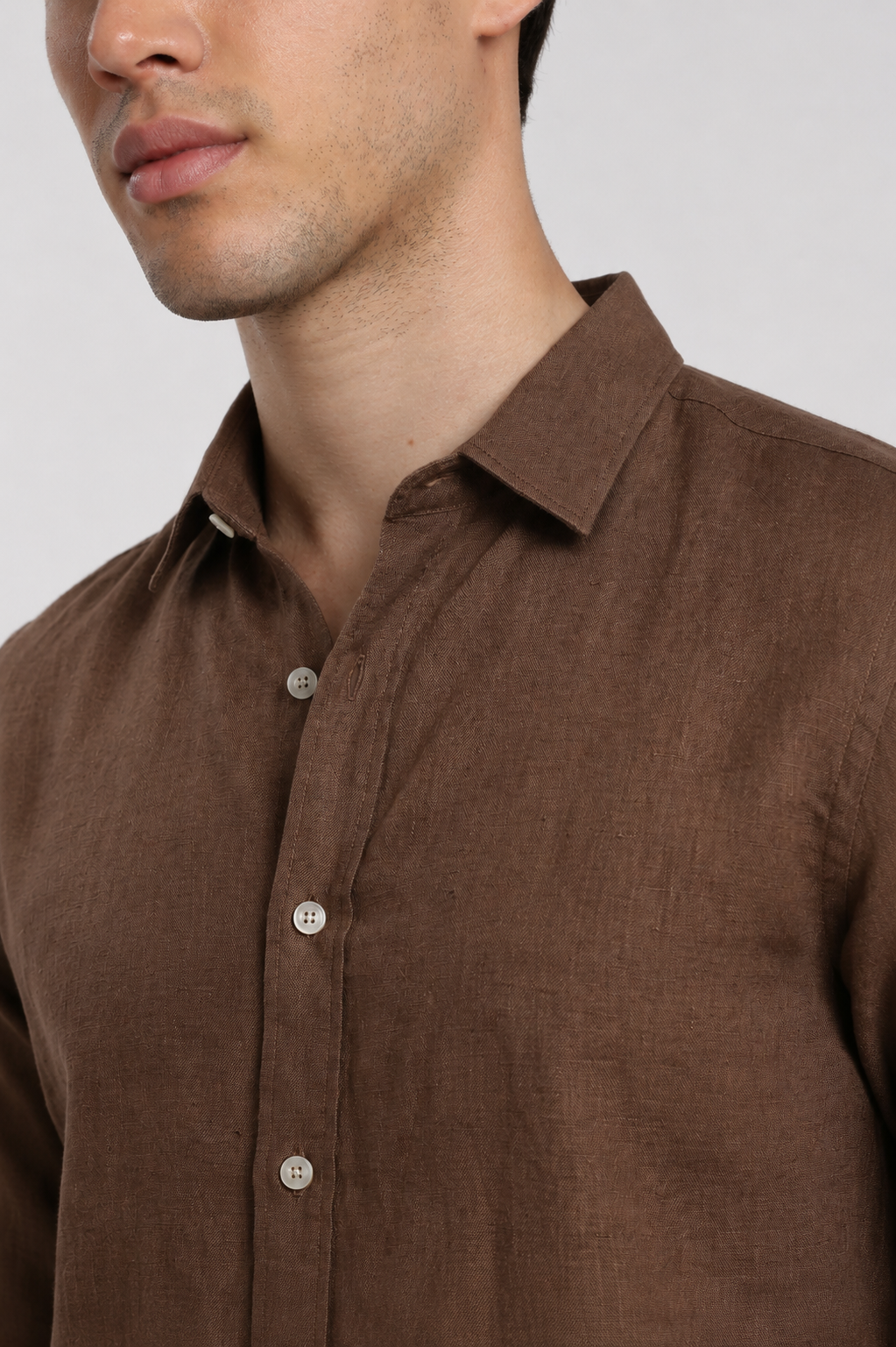 Close-up of chocolate brown linen slim fit shirt | Duch Clothing