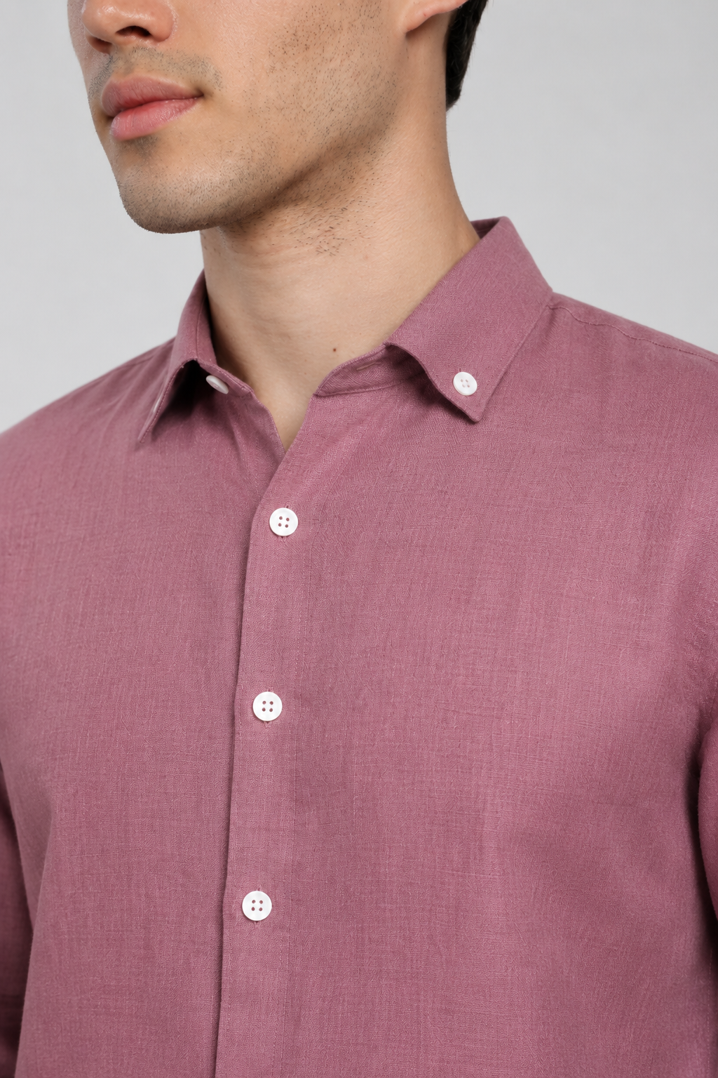 Mauve linen shirt folded – collar and button detail | Duch Clothing