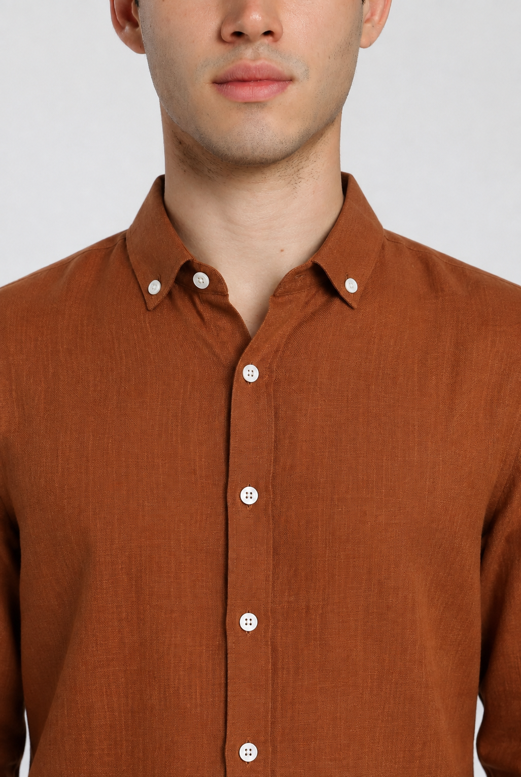 Close-up of rust orange linen slim fit shirt | Duch Clothing