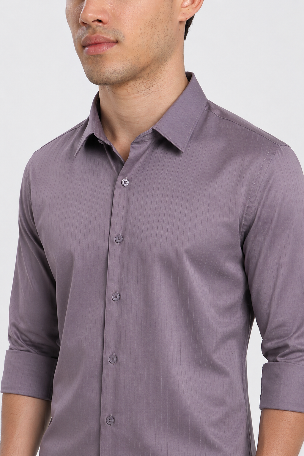 Close-up of man wearing a purple satin stripe slim fit full sleeve formal shirt by Duch Clothing